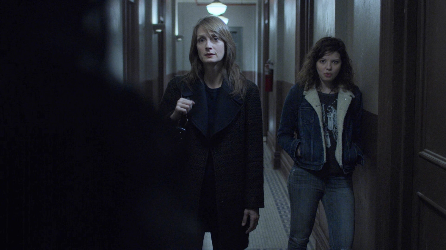 Michelle and Lexi Raymond in the hallway of Jessica's building.