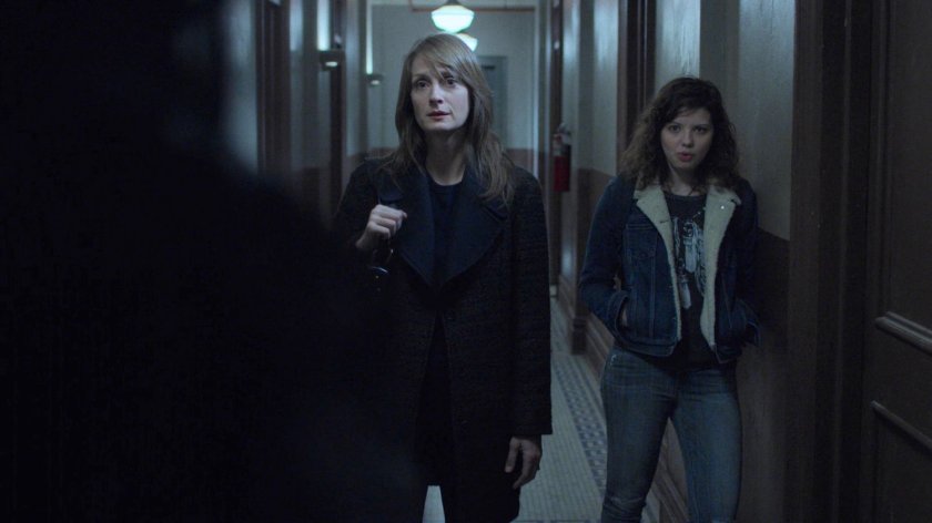 Michelle and Lexi Raymond in the hallway of Jessica's building.