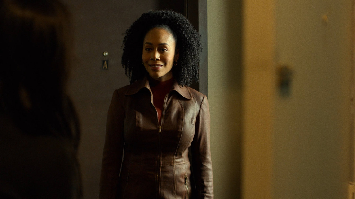 Misty Knight outside Claire's apartment.