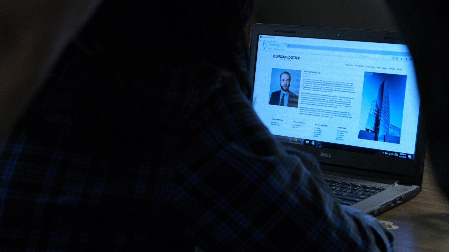 John Raymond bio on computer screen.