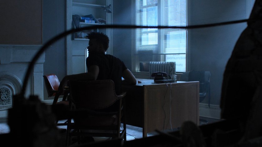 Malcolm in the Alias Investigation office.