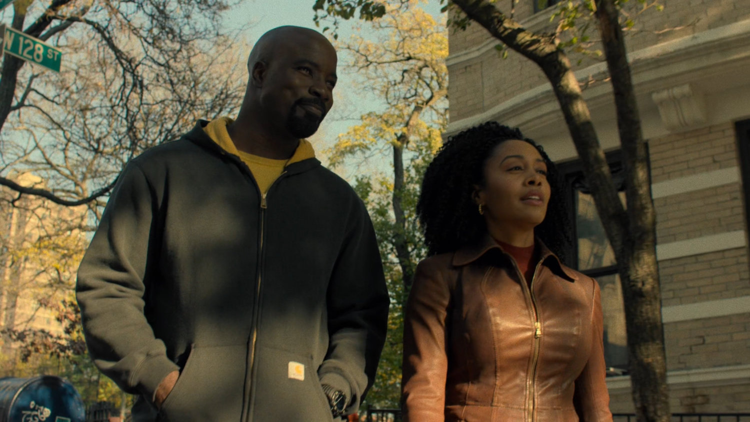 Luke and Misty walk along Harlem street.