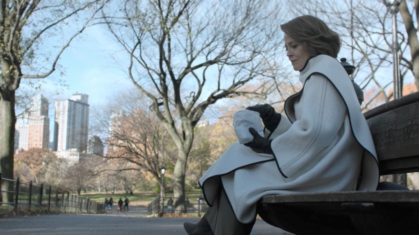 Alexandra sitting on bench in Central Park.