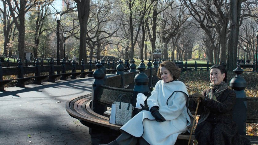 Alexandra and Madame Gao sitting on bench in Central Park.