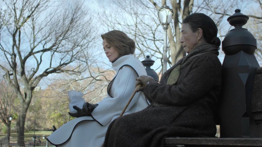 Alexandra and Madame Gao sitting on bench in Central Park.