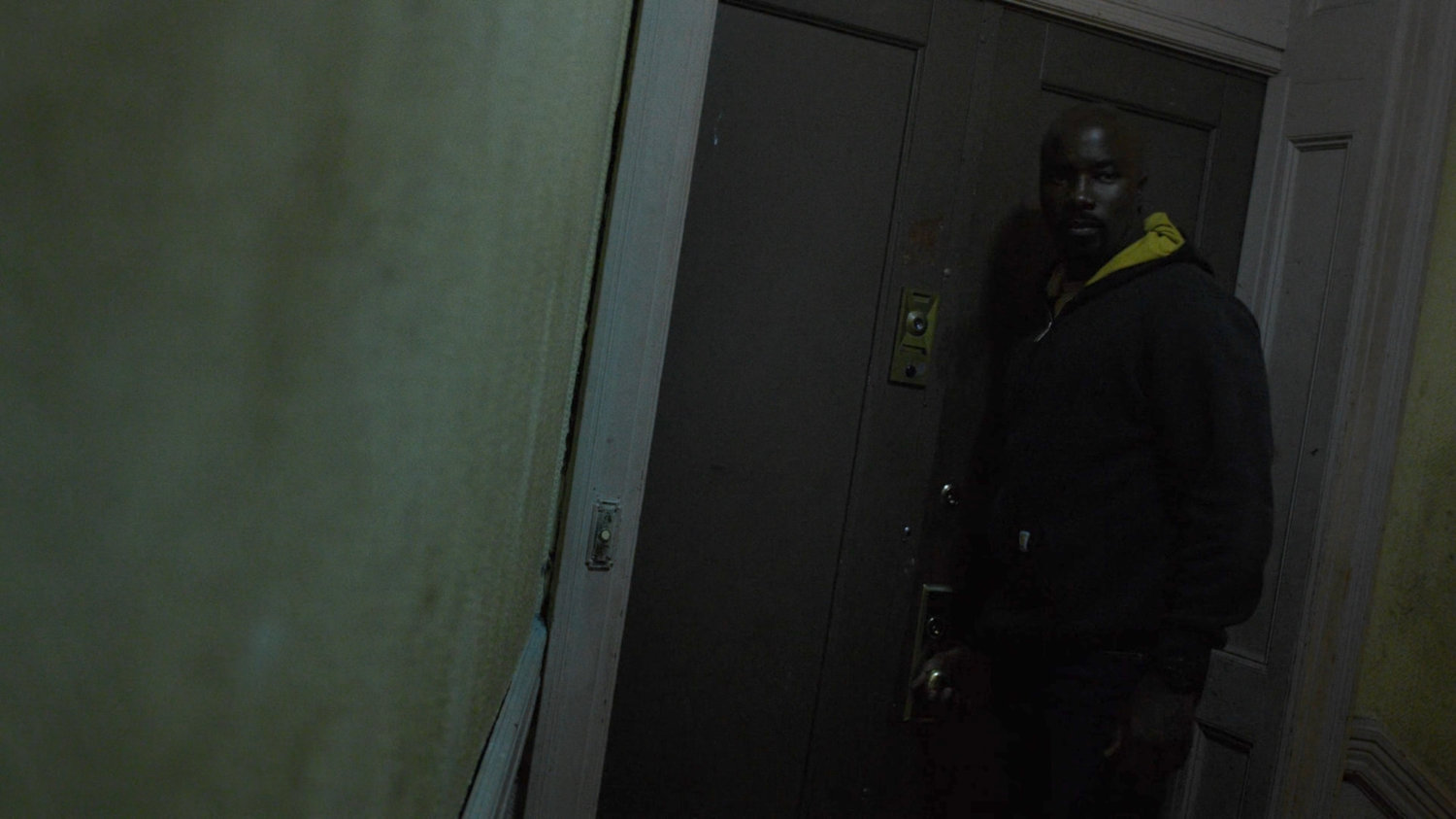 Luke at Cole Miller's apartment door.