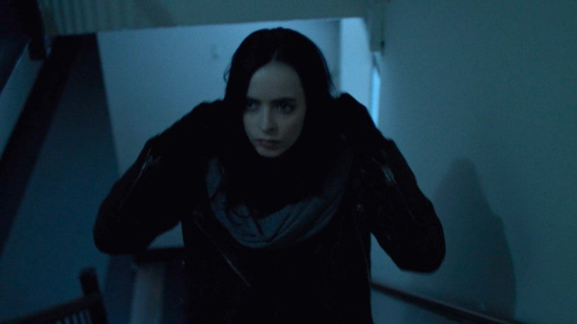 Jessica in John Raymond's motel stairwell.