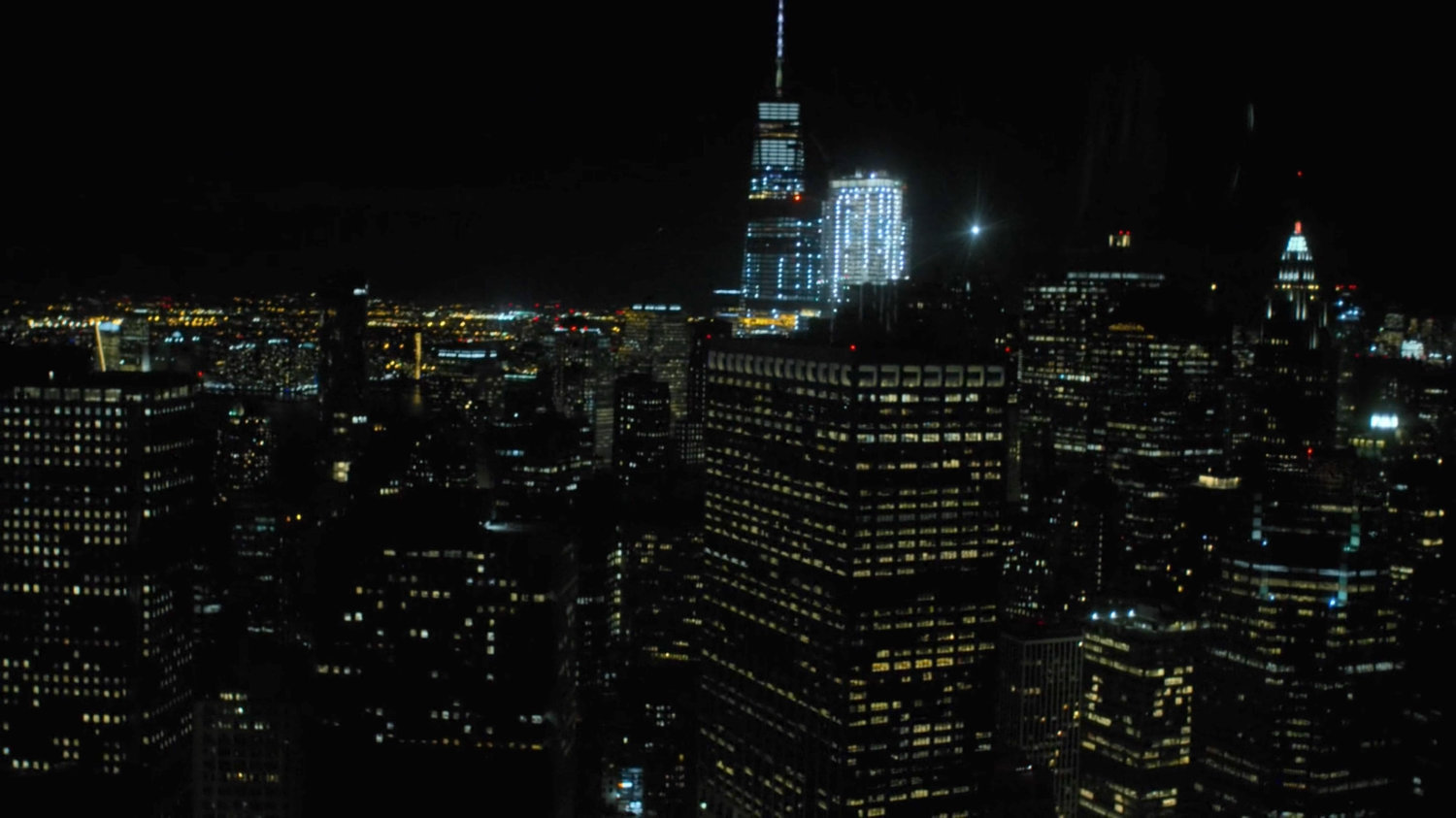 Nighttime aerial of New York City.
