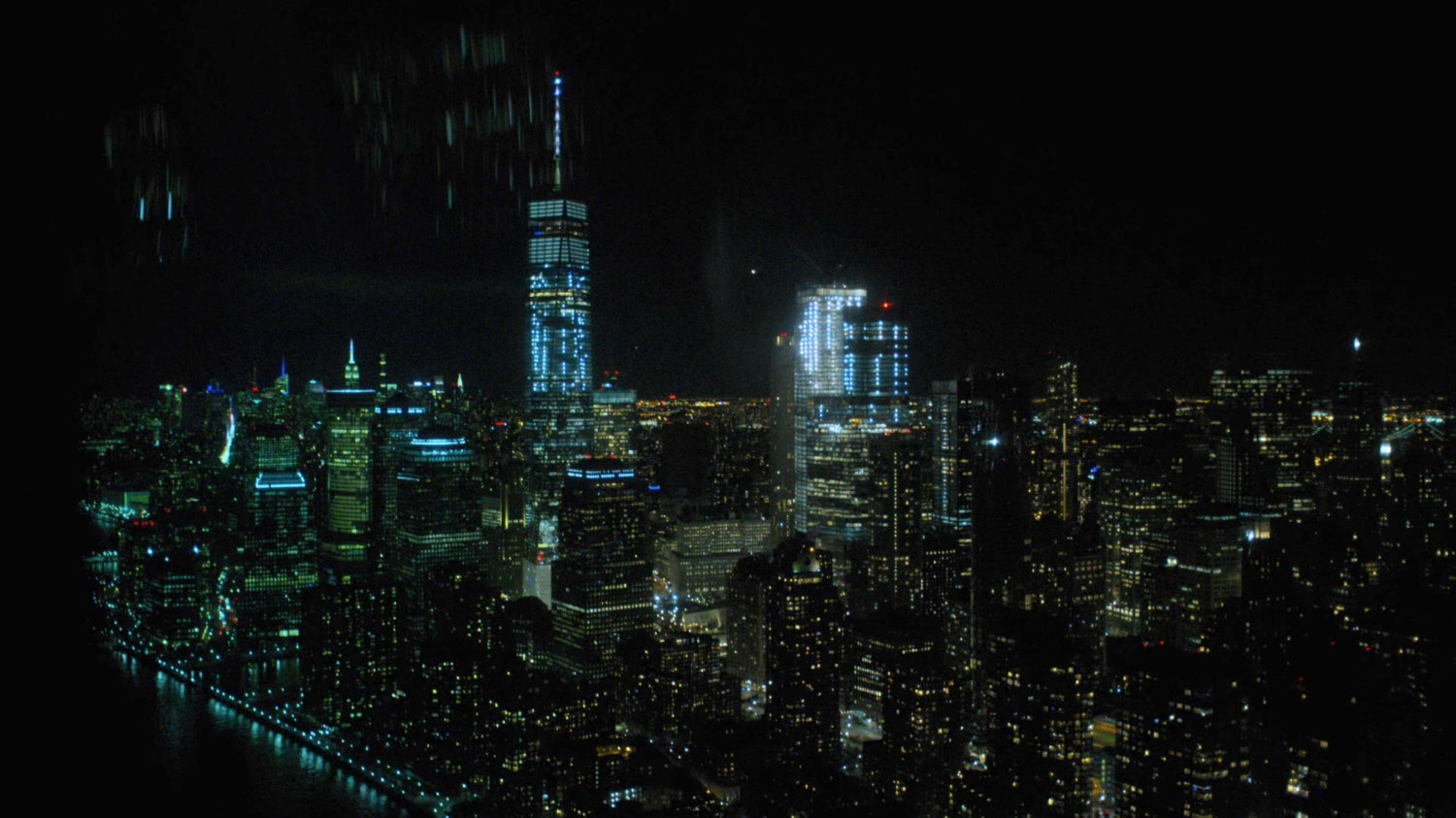 Nighttime aerial of New York City.