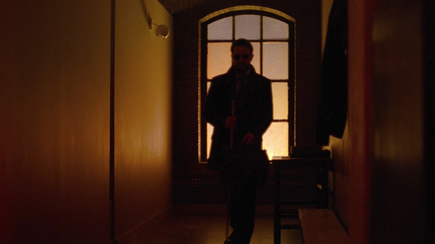 Matt enters his apartment.
