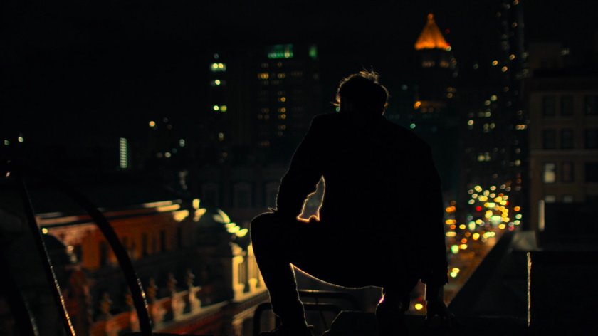 Matt perched on the edge of his rooftop.