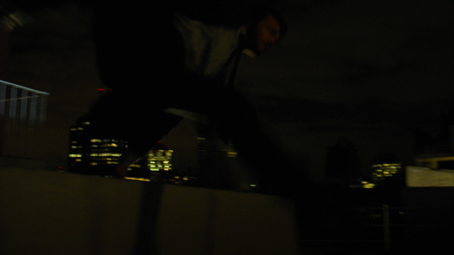 Matt running across his rooftop.