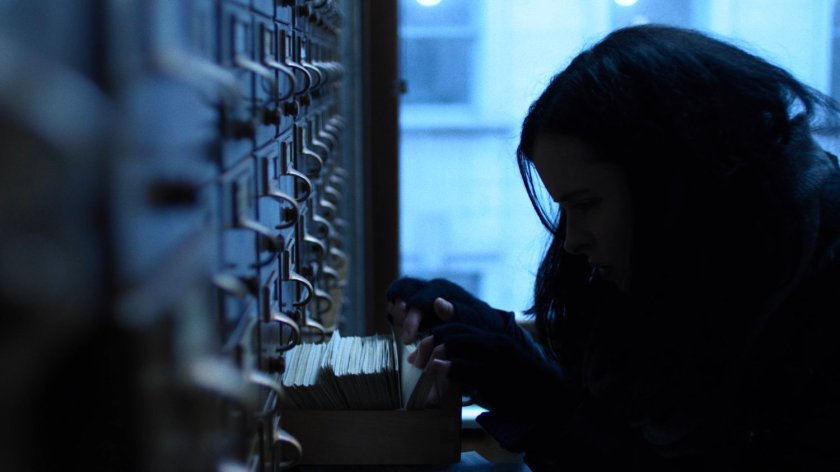 Jessica looks through a card catalog in the New York Archives.