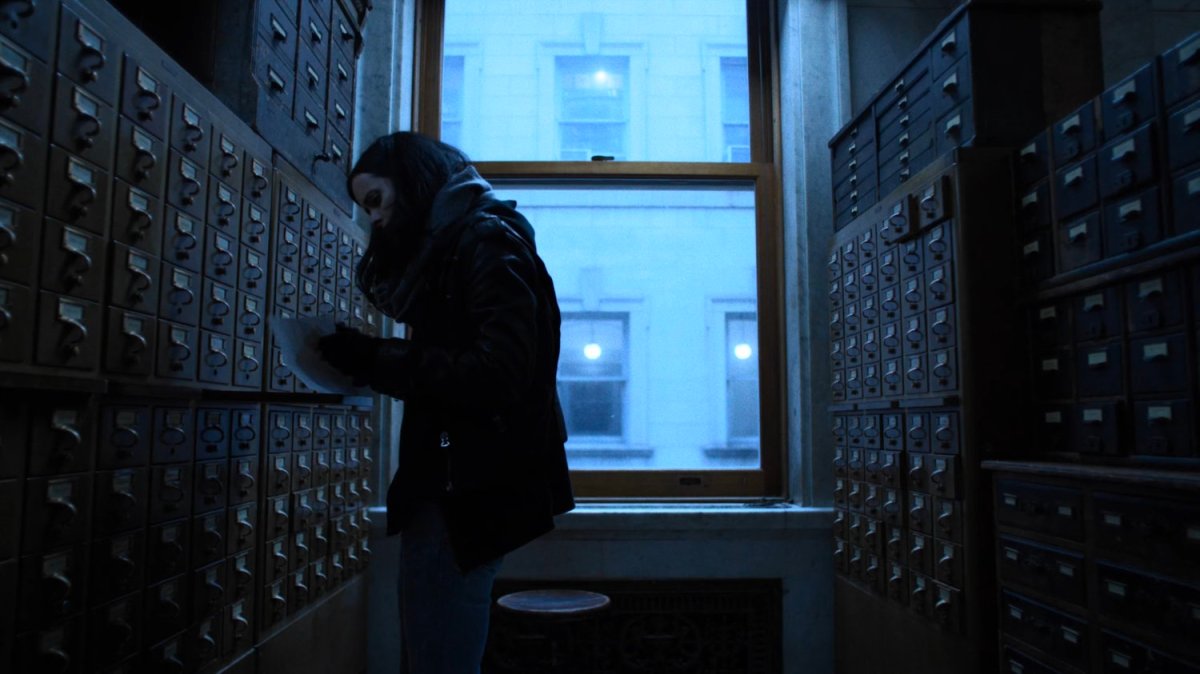 Jessica looks through a card catalog in the New York Archives.