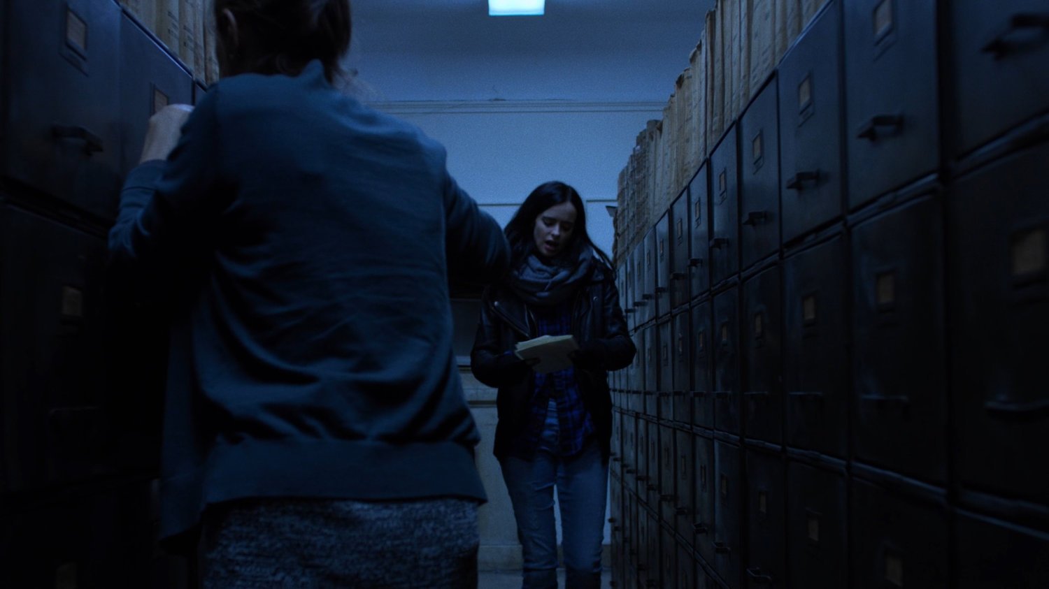 Jessica asking questions of a staffer in the New York Archives.