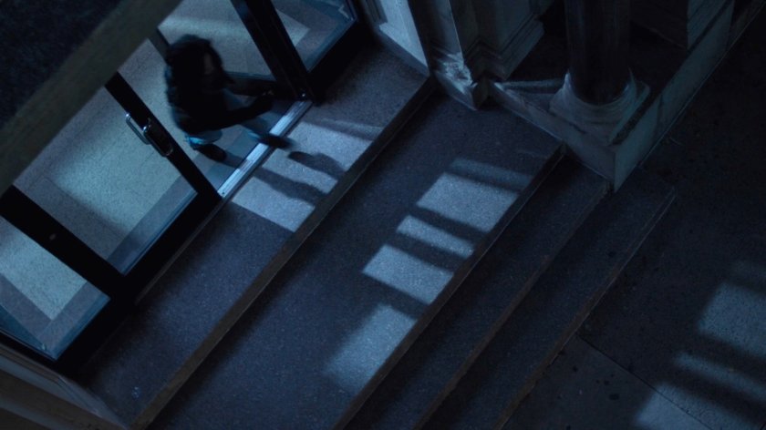 Jessica exits her building.