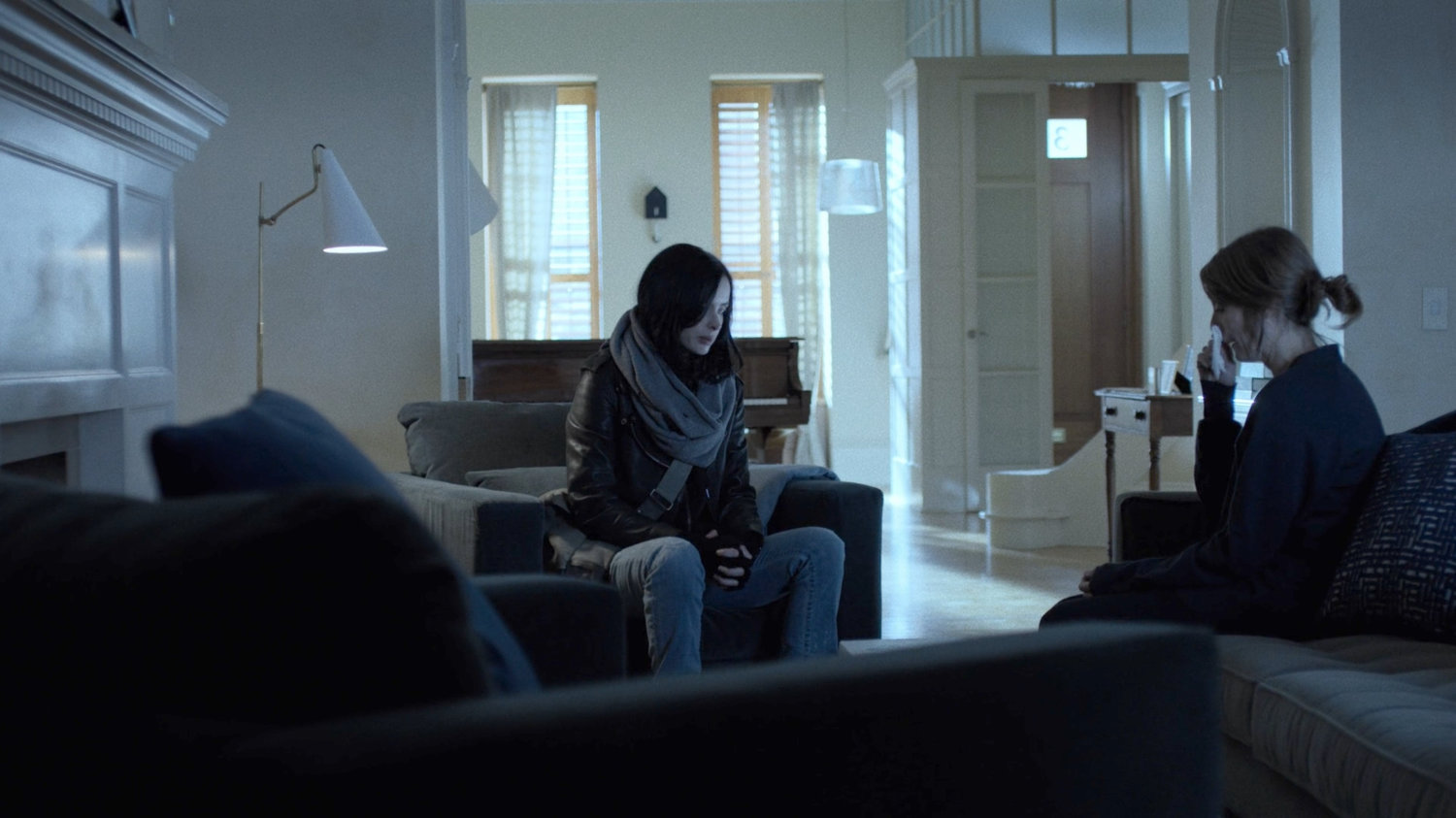 Jessica sits with Michelle Raymond in the Raymond family brownstone.
