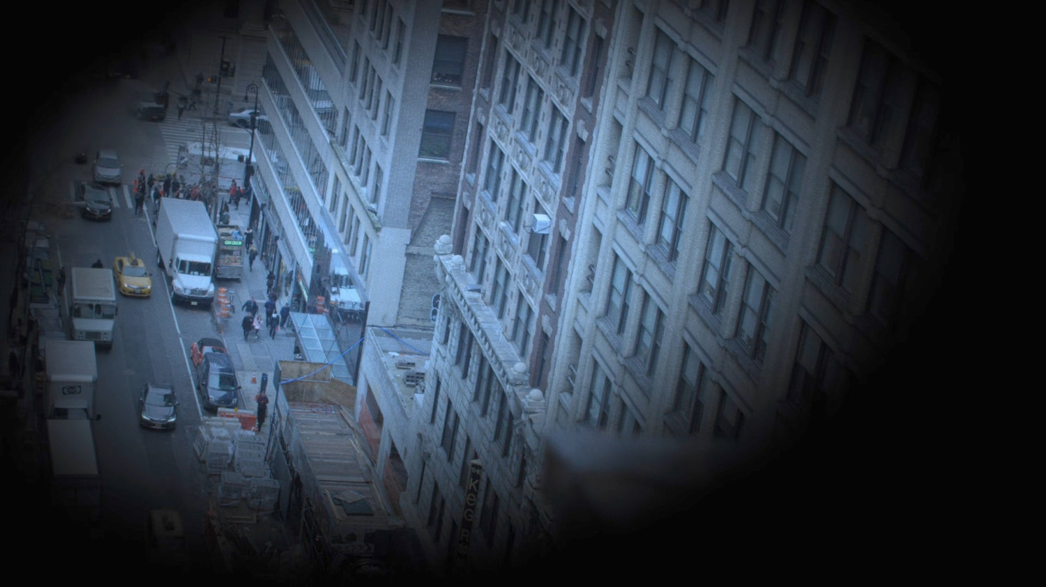 High angle interstitial view of buildings and street.