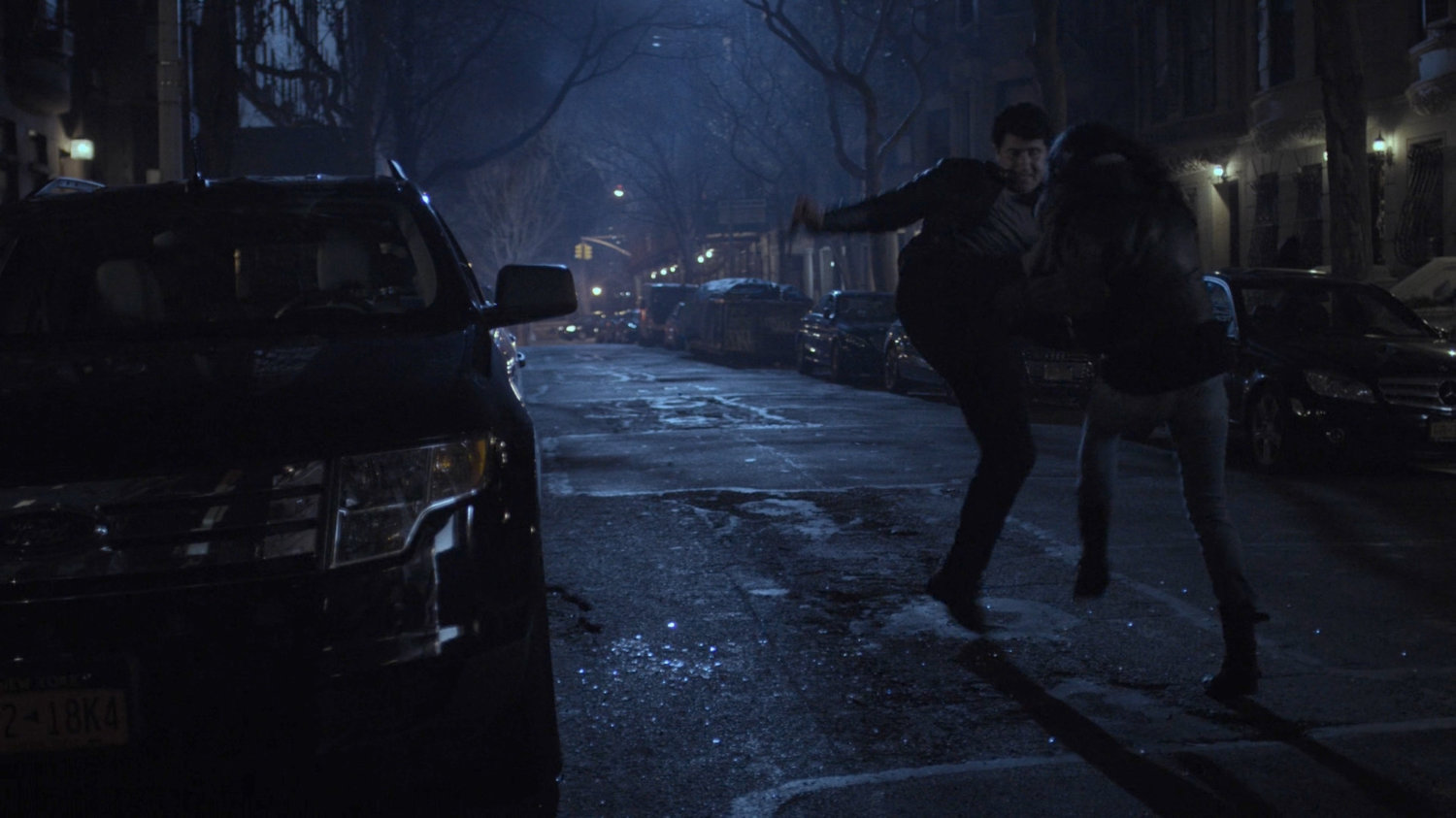 Jessica fights a Hand thug outside the Raymond brownstone.