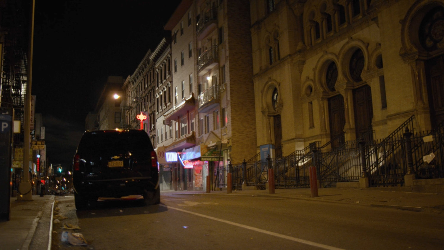 Madame Gao's SUV drives off.