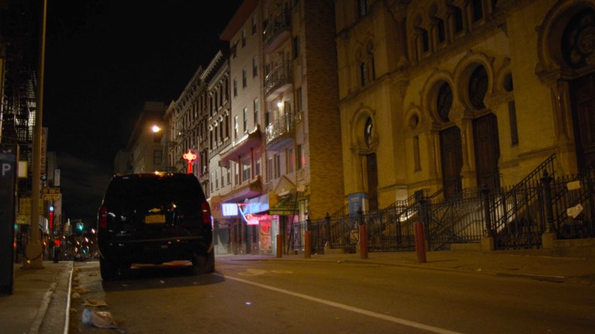 Madame Gao's SUV drives off.