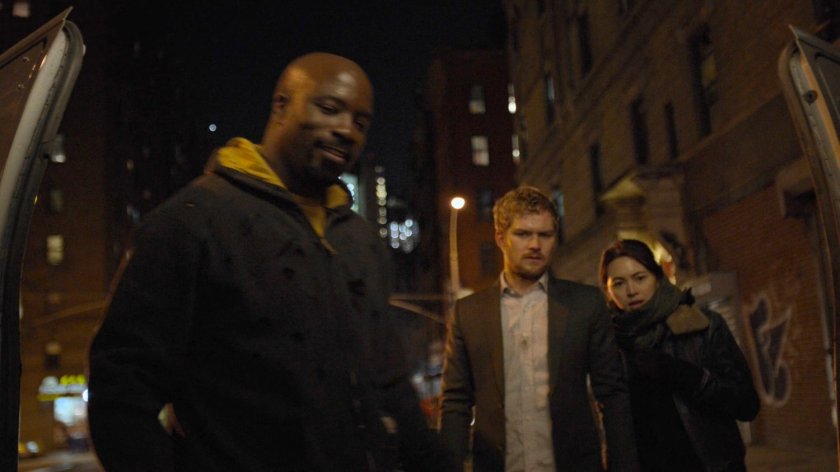Luke, Danny, and Colleen look into the back of a van outside the Chikara Dojo.