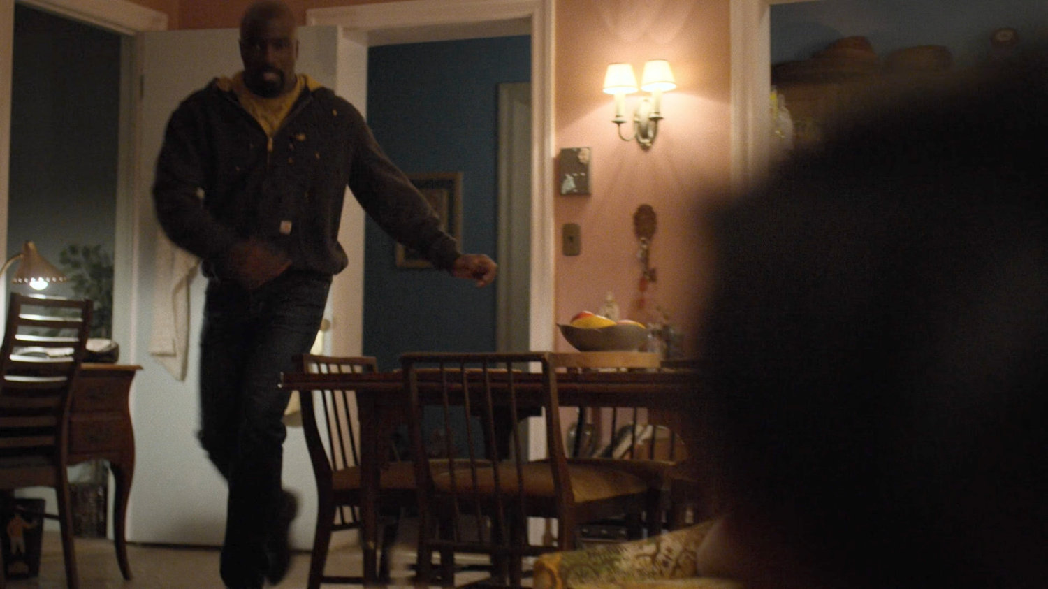 Luke rushes into Claire's apartment.