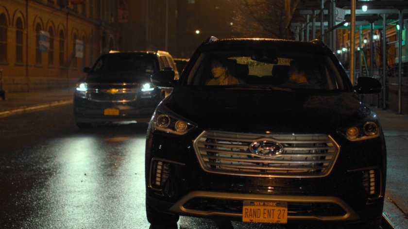 Danny and Colleen parked in car in front of Claire Temple's apartment building.