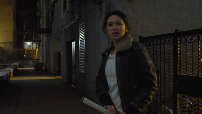 Colleen in a wide alley.