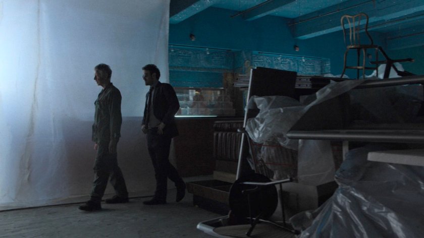 Matt and Stick in the back room of a derelict theater.