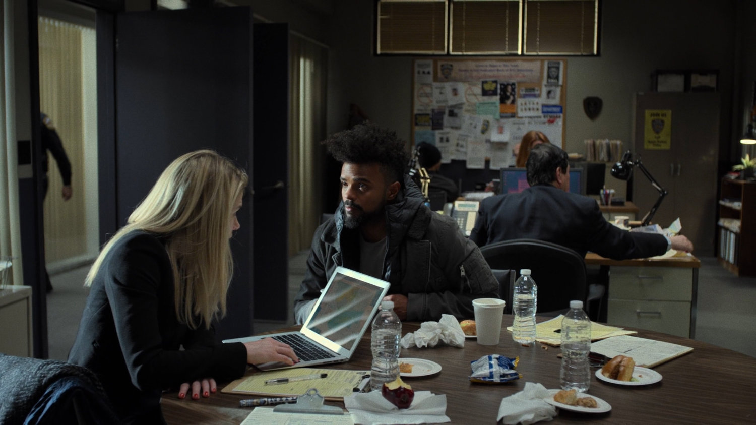 Trish and Malcolm in the 29th Precinct offices.
