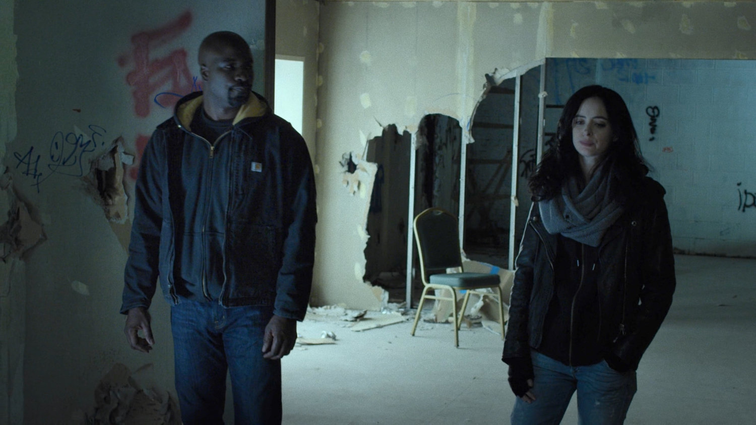 Luke and Jessica in a 2nd floor room at a dilapidated theater.