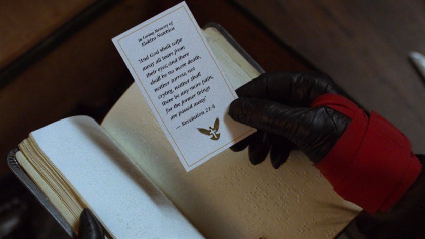 Closeup of Memorial card from Elektra's funeral.