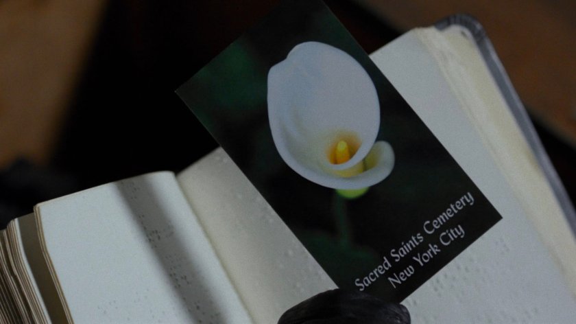 Closeup of Memorial card from Elektra's funeral.