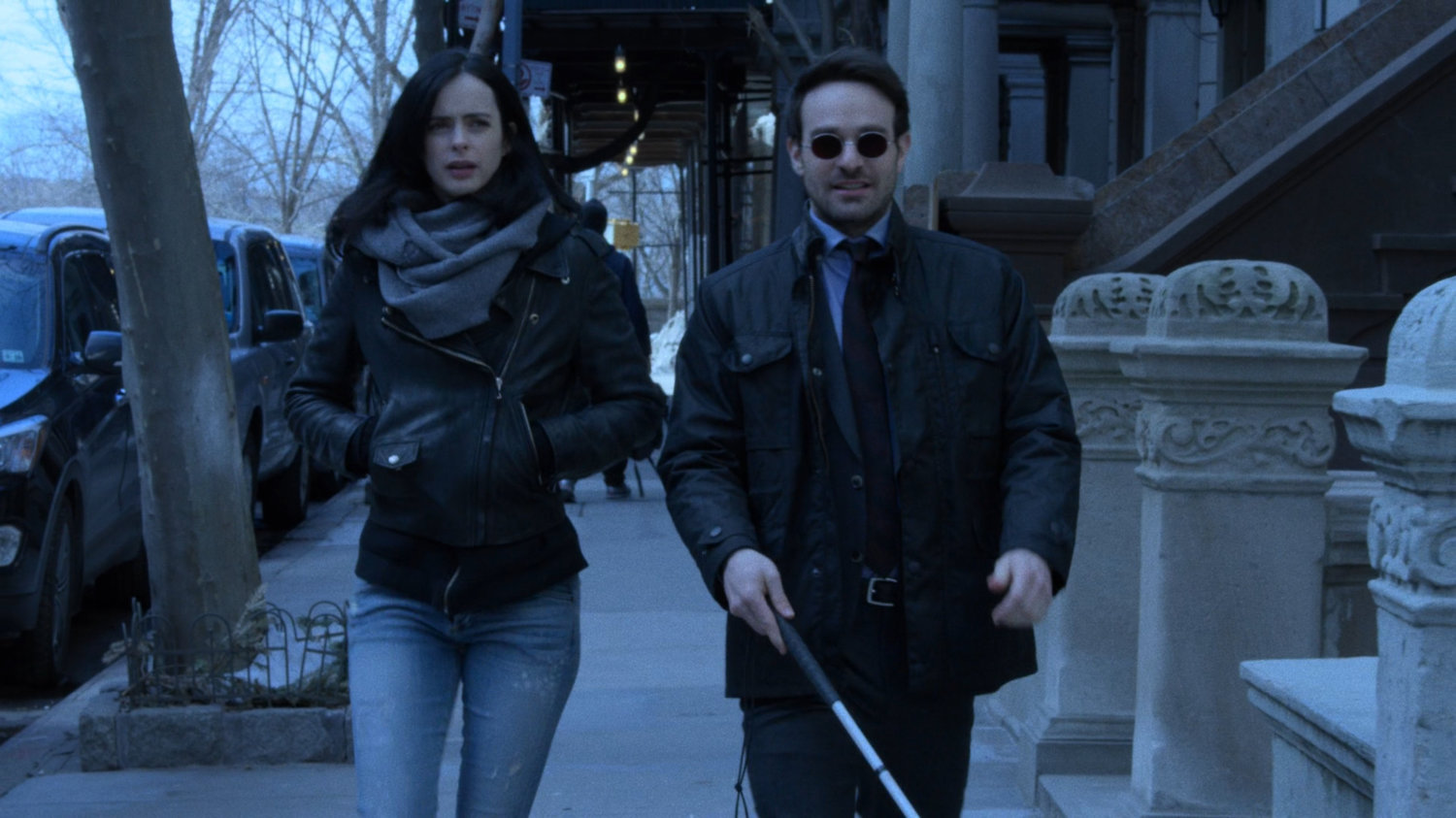 Jessica and Matt on the sidewalk outside the Raymond brownstone.