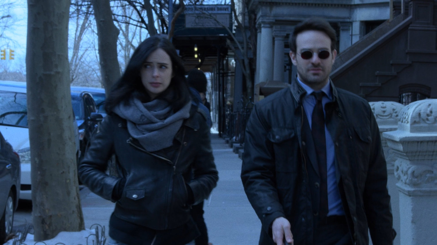 Jessica and Matt on the sidewalk outside the Raymond brownstone.