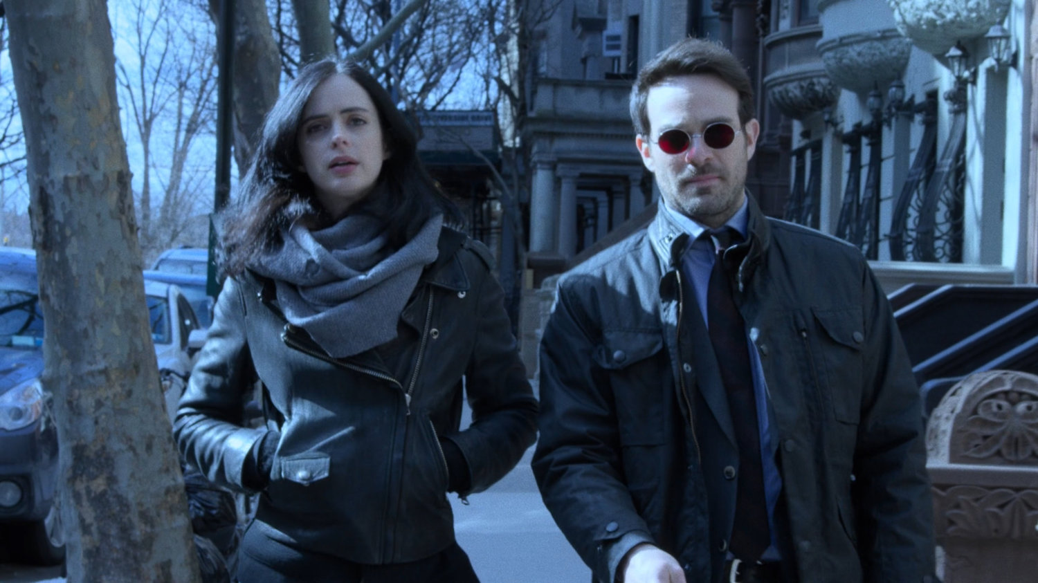 Jessica and Matt on the sidewalk outside the Raymond brownstone.