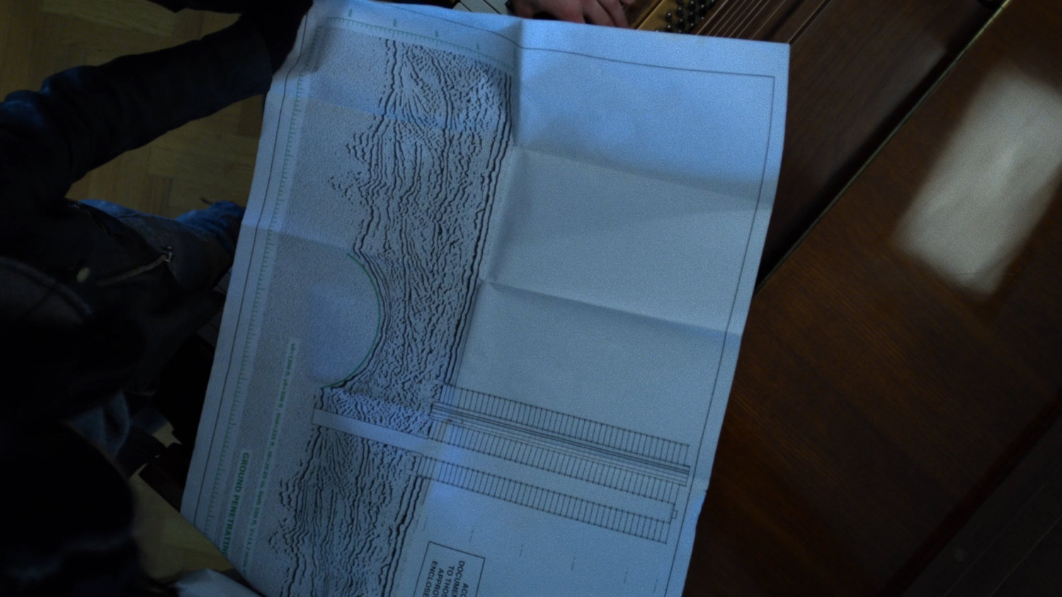 Overhead shot of Midland Circle blueprints.