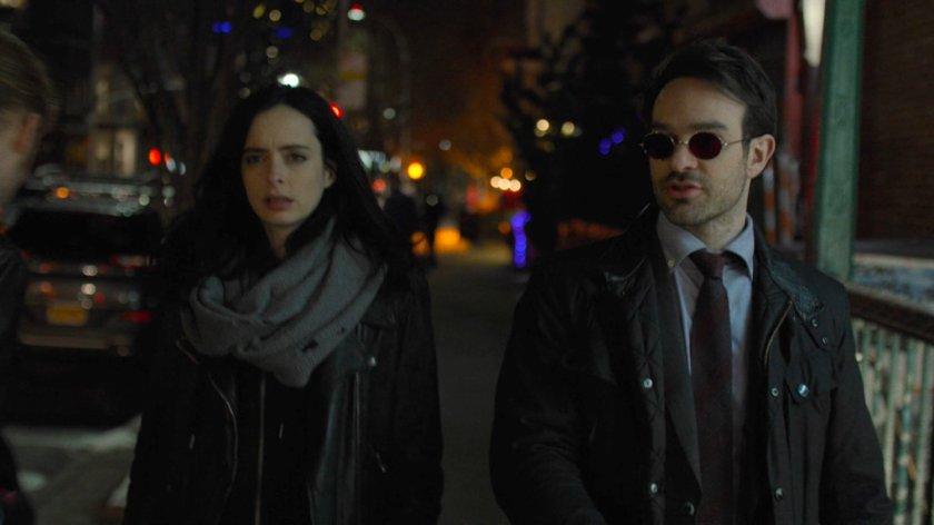 Jessica and Matt on nighttime sidewalk.