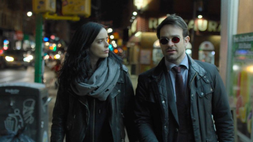 Jessica and Matt on nighttime sidewalk.