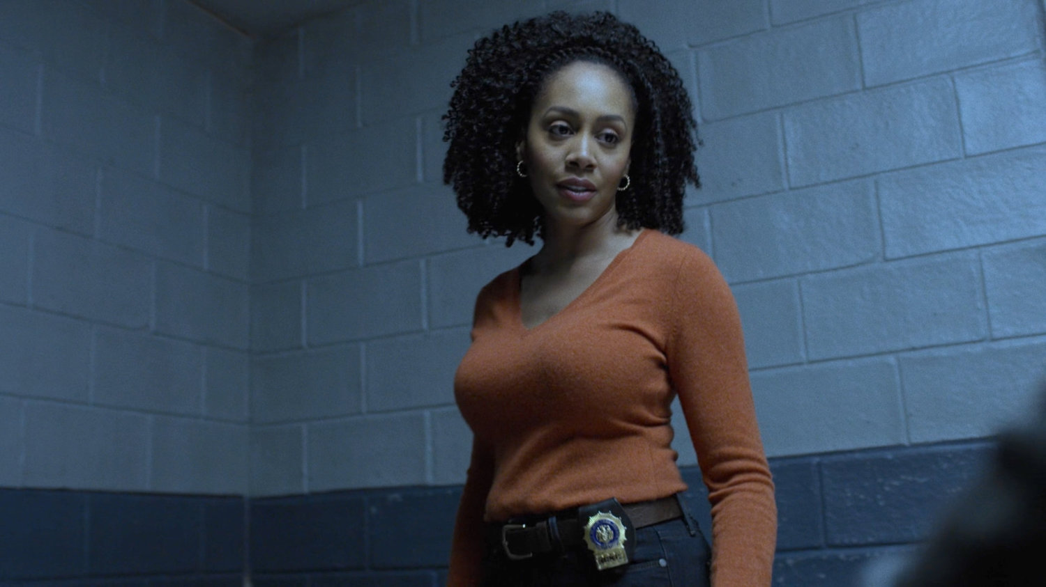 Misty Knight in the interrogation room of the 29th Precinct.