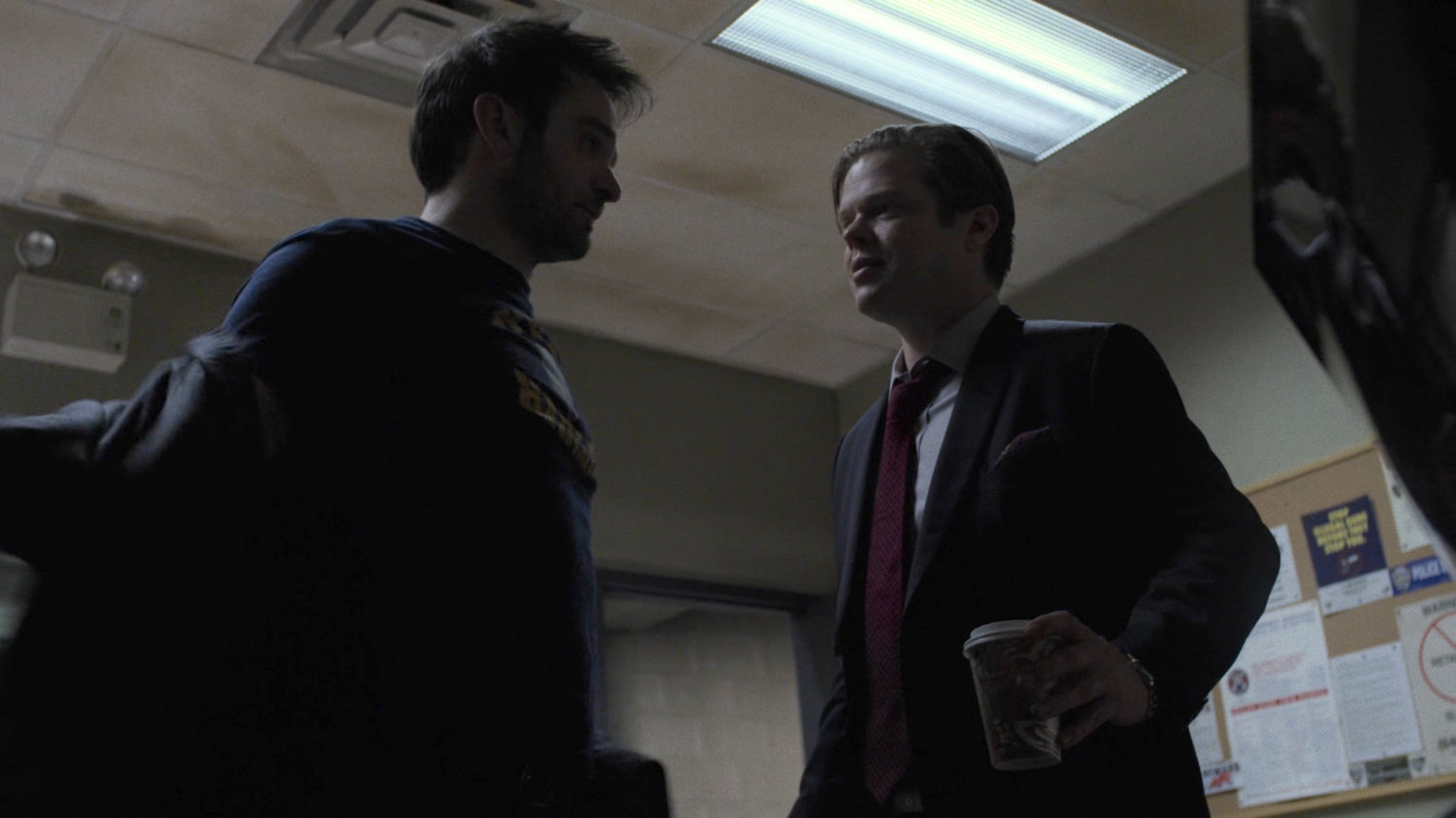 Matt and Foggy in an office at the 29th Precinct.
