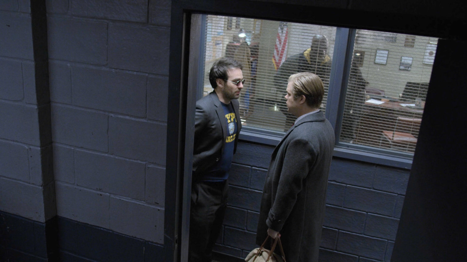 Matt and Foggy outside an office at the 29th Precinct.