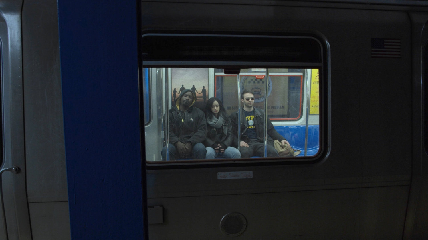 Luke, Matt and Jessica on a subway car.
