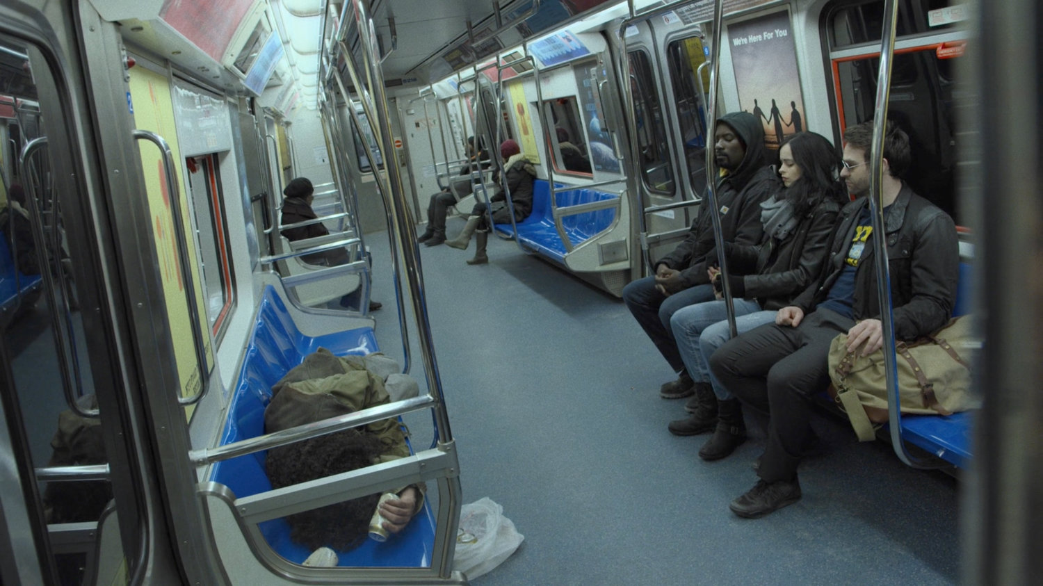 Luke, Matt and Jessica on a subway car.