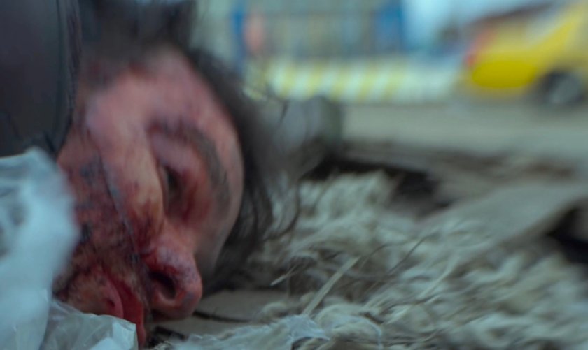 Matt Murdock lying on the shoreline, nearly dead.