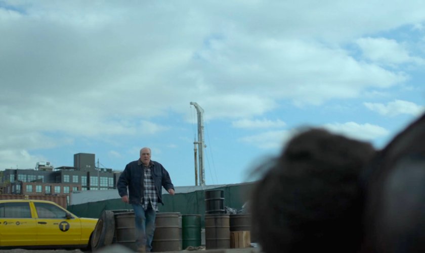 A taxi driver approach the unconscious Matt.