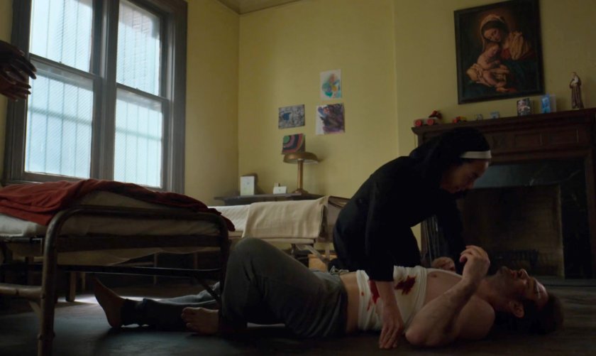 Maggie helps a wounded Matt at St. Agnes Orphanage.