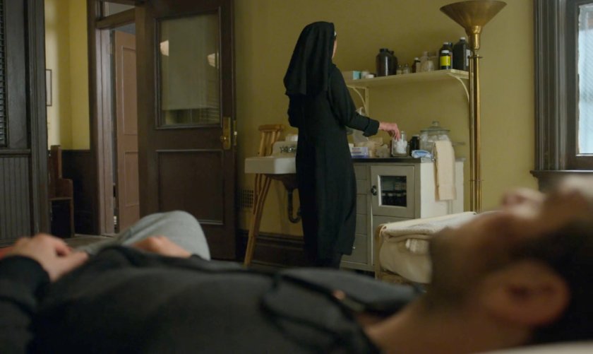 Maggie helps a wounded Matt at St. Agnes Orphanage.