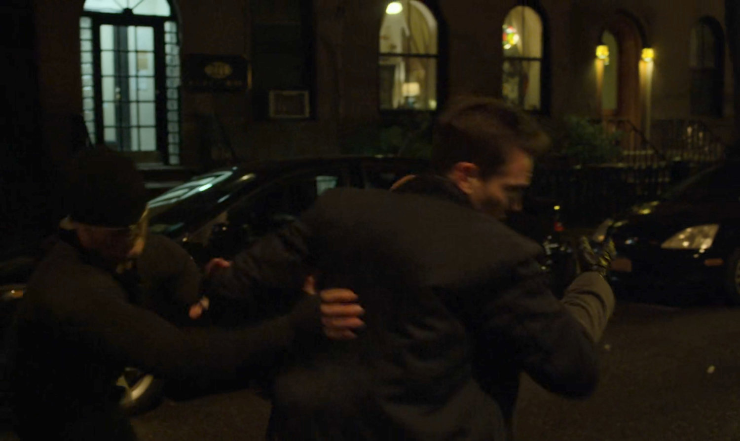 A man is abducted on a dark street.